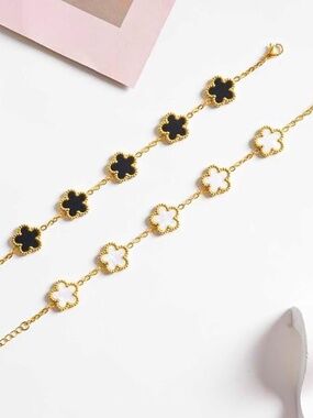 18KT Gold and Black Clover Bracelet new